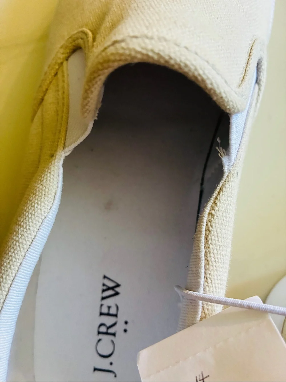 J. Crew Men's Slip-On Canvas Loafers in Light Beige with dust stain on inside.
